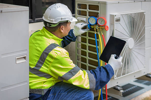 Professional Heat Pump Repair technician working in Rainbow, TX